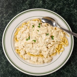Chicken Alfredo over Fettuccini