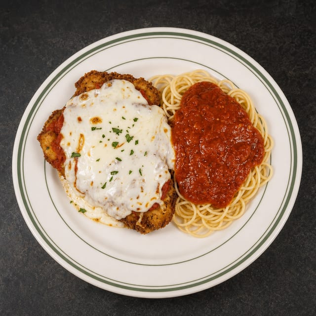 Veal Parmigiano w. Spaghetti Marinara.